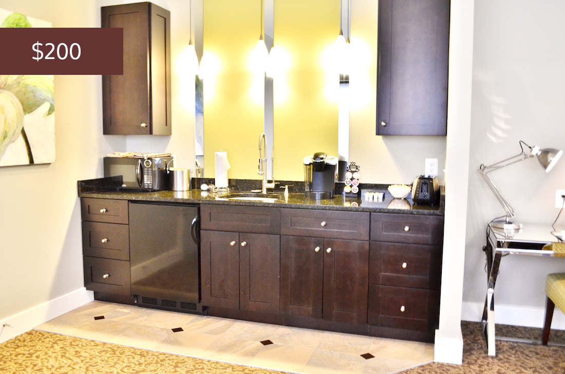 Showing the wet bar, the Luxury Suite with Kitchenette at the Culpeper Center rents for $200 per night.